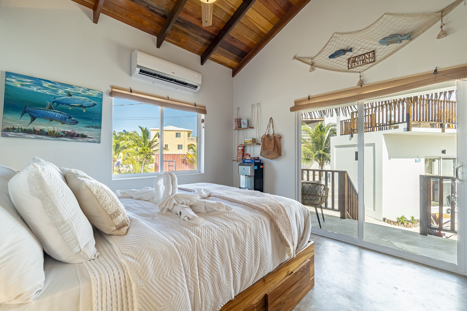 Tarpon Room bedroom with sliding doors opening to the porch